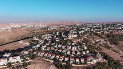 Title: UK, Australia, and Canada Express Concern Over New Settlement Units in the West Bank