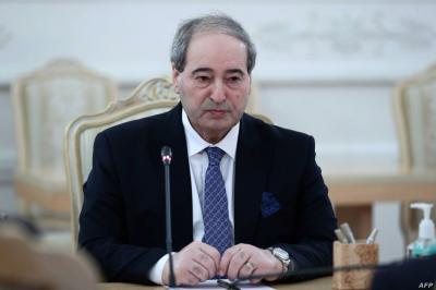 Title: Al-Maqdad Discusses the Importance of Strengthening Bilateral Relations with His Tunisian Counterpart