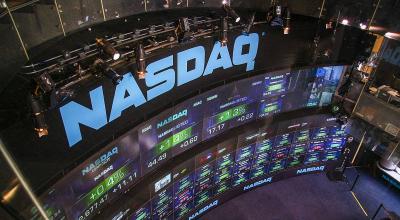 Nasdaq Rises Fueled by Tesla Stock Surge