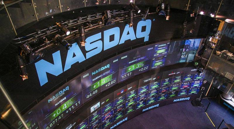 Nasdaq Rises Fueled by Tesla Stock Surge