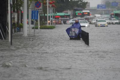 Heavy Rains Sweep Through China, Causing Road Closures