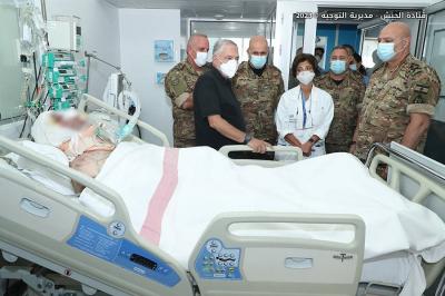 Army Commander Visits Injured Aide in Hotel Dieu Hospital