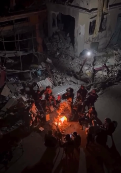 Title: Gaza Residents by the Ruins of Their Homes in "Fire Gathering" (Video)