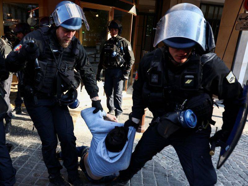 Title: French Police Clash with Climate Activists
