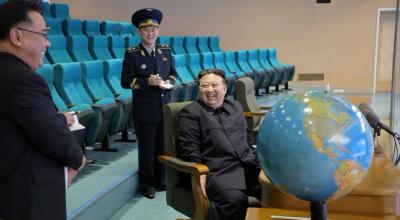 Title: North Korean Leader Inspects Spy Images