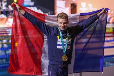 French Swimmer Marchand Breaks Phelps' World Record