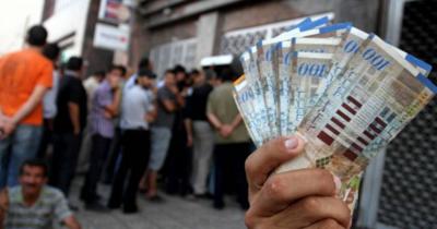 Title: "Hamas Disburses Delayed Salaries in Gaza"