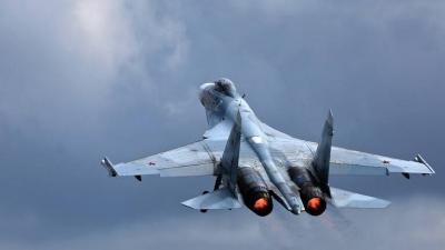 Title: Russian Defense: Su-27 Fighter Intercepts Two American Bombers in the Baltic Sea