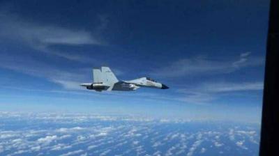 U.S. Military Plane Narrowly Avoids Collision with Chinese Fighter Jet