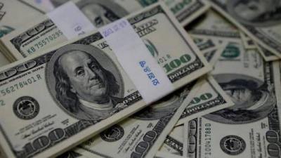 Dollar Declines After Easing Covid-19 Restrictions Boosts Risk Appetite