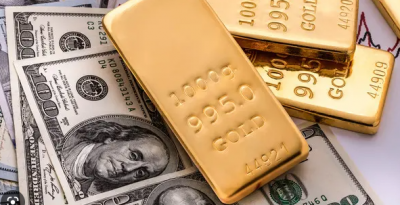 Gold Retreats as Dollar Rises