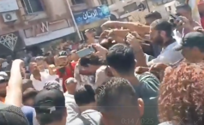 Title: Protesters in Sweida Destroy Hafez Assad Statue and Tear Up Bashar Poster