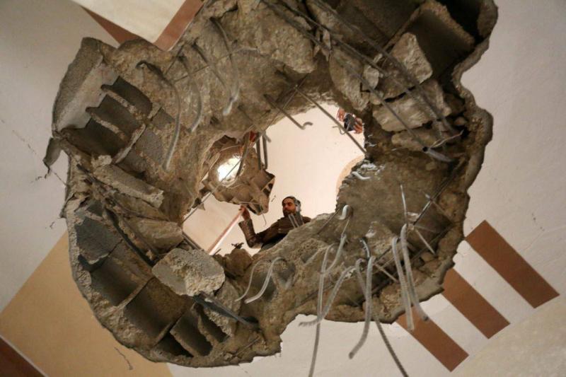 Title: Palestinian Family Escapes Death as Rocket Falls Without exploding