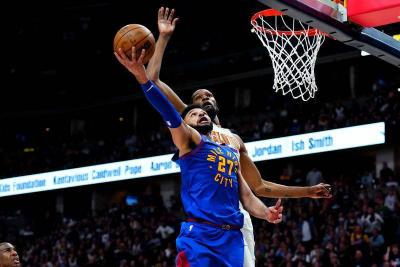 Murray Shines as Nuggets Lead Suns