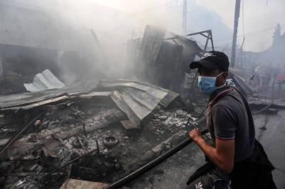 Title: Five Palestinians Killed in Israeli Airstrike on Nuseirat Camp