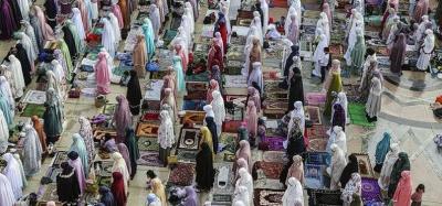 Title: Indonesian and Malaysian Muslims Celebrate Eid al-Fitr with Eased COVID Fears