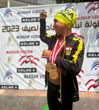 Child Mohammed Salameh: Lebanon Champion with Four Gold Medals and Three Record-breaking Swim Times