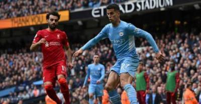 مانشستر سيتي وليفربول يفلتان من 