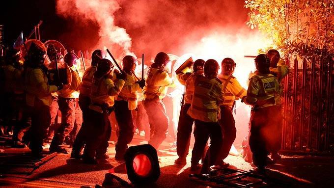 Title: England: Police Arrest 46 People Due to Football Riots