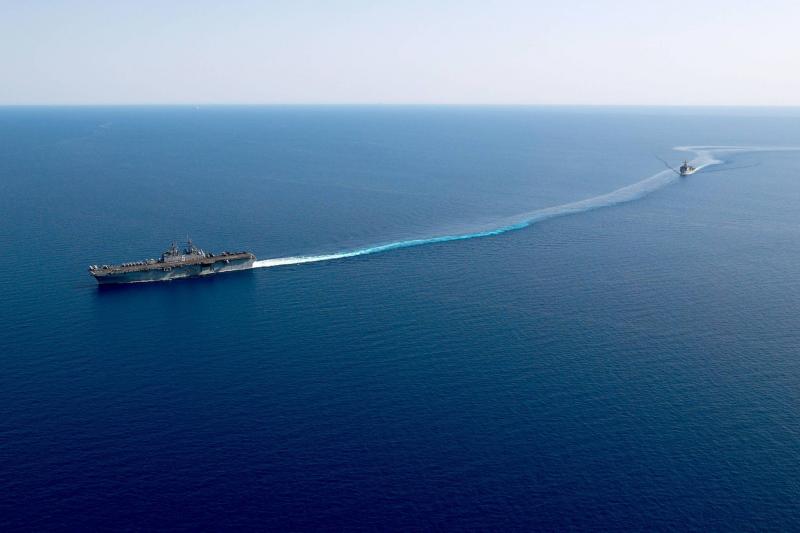 Approach of 4 Small Boats to Ship in the Red Sea