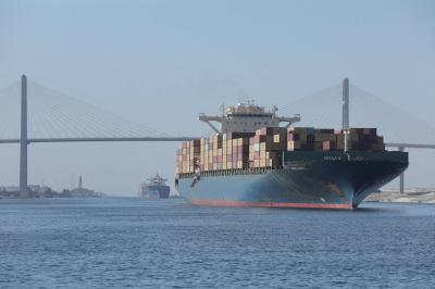 Title: British Authority: Boats Approaching Commercial Ship Near Yemen