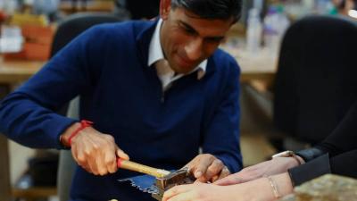 British Prime Minister Ridiculed Over Hammer Use