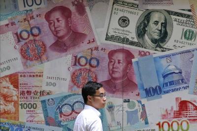 Dollar Rises Following US Inflation Report and Yuan Stability