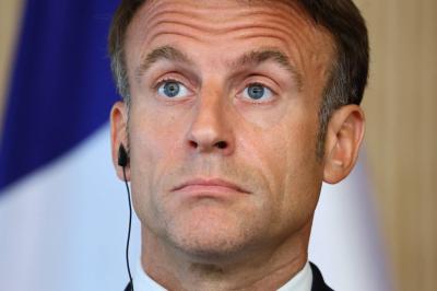 Macron Calls for a "Strong" Government Response Following Teacher's Murder