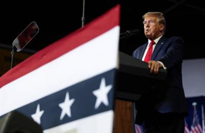 Trump Flirts with Putin