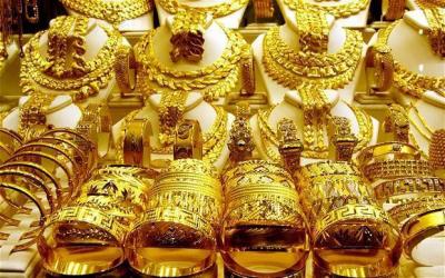 Gold Rises as Dollar Declines Boost Demand