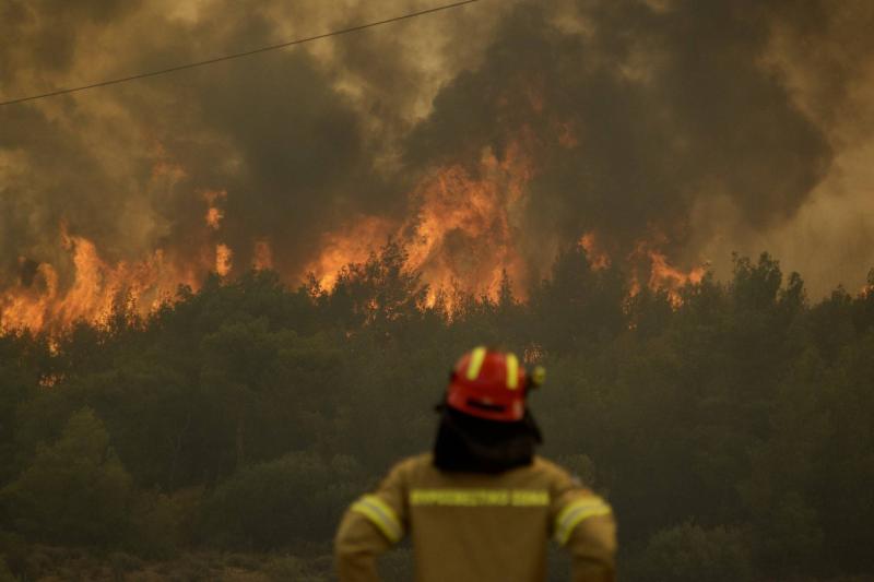 Title: Wildfires Continue in Greece for the Third Day