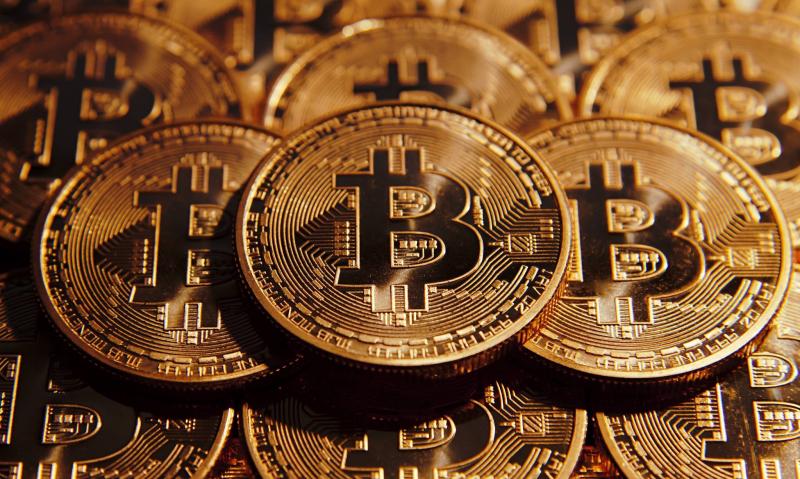 Bitcoin Drops After Surge Above $73,000
