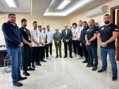 Title: Minister Klass Congratulates "Muay Thai" Champions on Their International Achievements