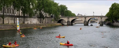 Title: Paris Mayor Promises to Swim in the Seine River Before Olympics