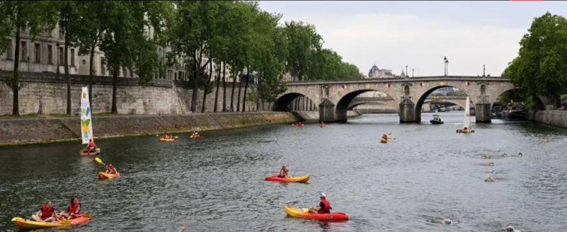 Title: Paris Mayor Promises to Swim in the Seine River Before Olympics