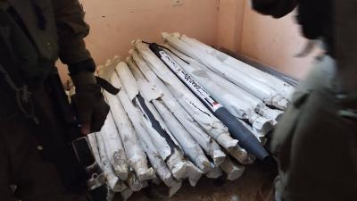 Israeli Army Discovers Weapons Under UNRWA Boxes - Video and Photos