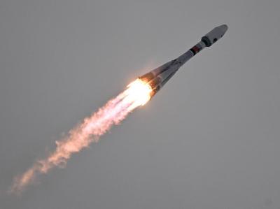 Soyuz Spacecraft Docks with International Space Station Carrying Three Astronauts