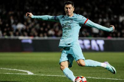 Title: Barcelona's Hard-Fought Victory Over Unionistas