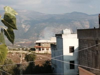 Title: Shelling on the Outskirts of the Lebanese Town of Khyam