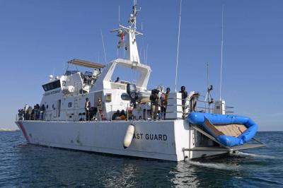 Title: Tunisian Coast Guard Recovers Bodies of 13 Migrants and Rescues Hundreds