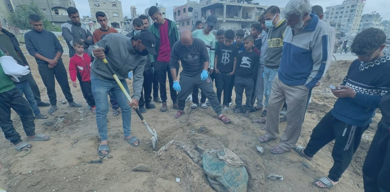Title: After 88 Days, a Palestinian Finds His Wife's Hair and Remains of His Children (Video)