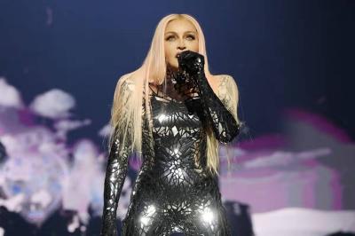Madonna in Trouble: Asked a Man in a Wheelchair to "Stand Up"!