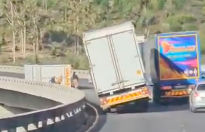 Video: Strong Winds Cause Truck to Fall from Bridge
