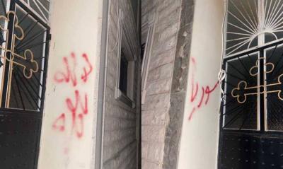 "There's No God but Allah and the Word Syria" on the Wall of a Church in Al-Duniyah