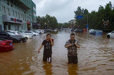 Flooding Rivers and Submerged Cities Test Disaster Response Systems in China