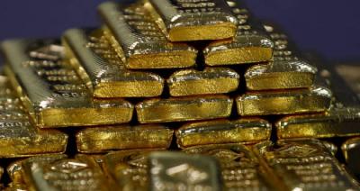 Gold Drops Amid Caution Ahead of U.S. Federal Reserve Monetary Policy Decision