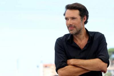 French Director Faces Trial Over Kiss on Woman's Neck
