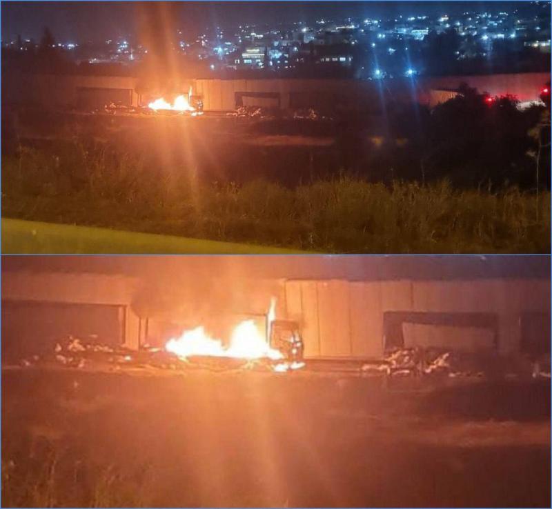 Title: Israeli Settlers Burn Aid Trucks Heading to Gaza