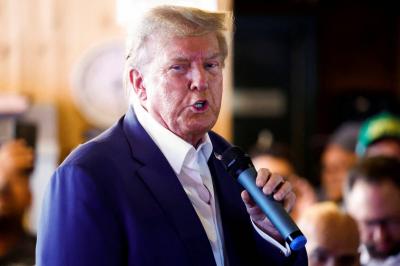 Arrest of a Chicago Woman Who Threatened to Shoot Trump and His Son