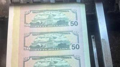 Title: Images - Printing Press Detained for Counterfeit Currency